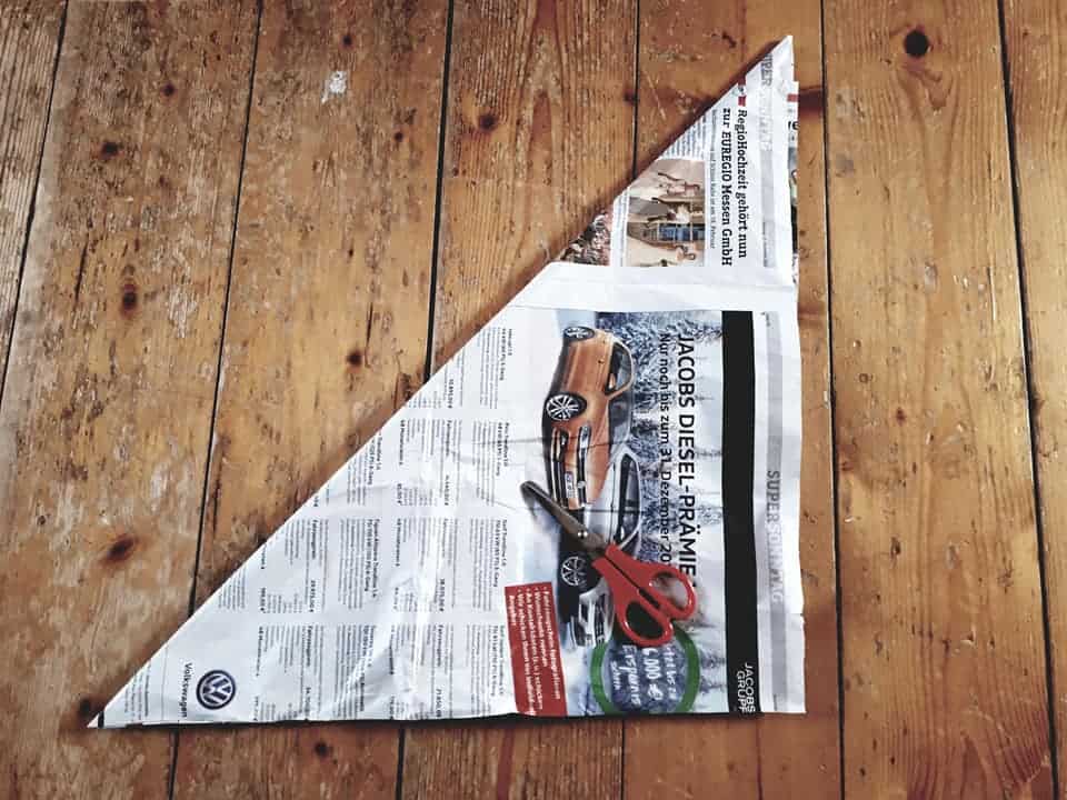 Folding garbage bags from newspaper