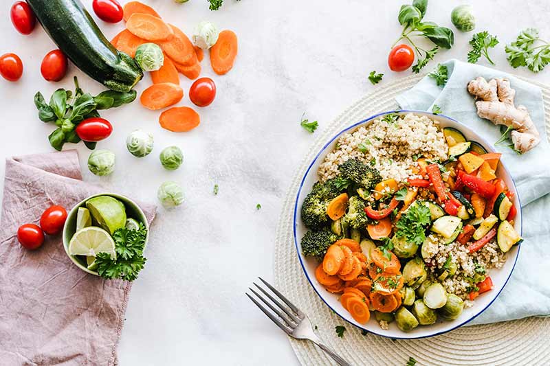 Healthy food plate with quinoa and vegetables