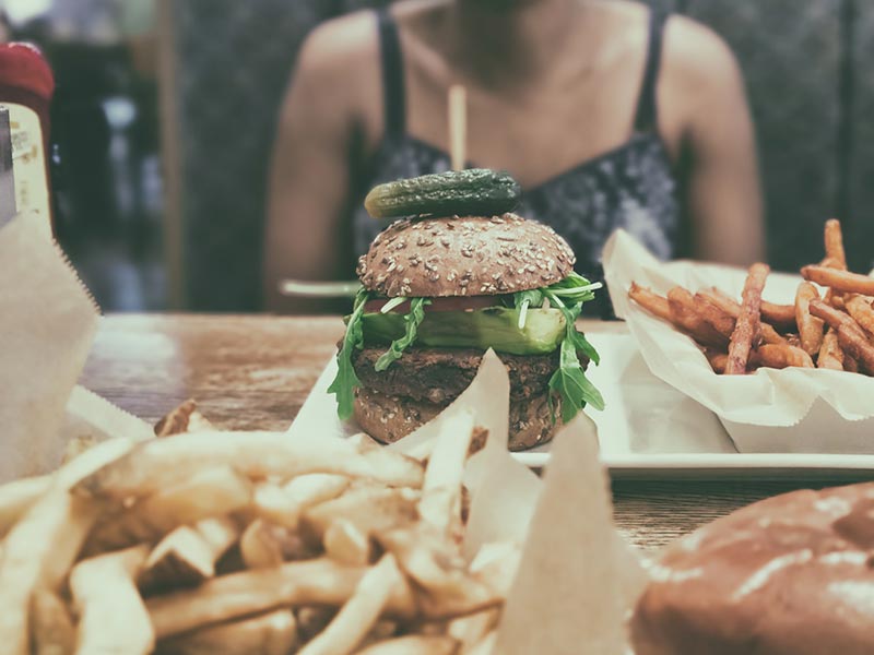 A vegan burger with fries