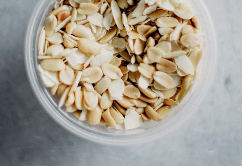 Biotin is found in many foods - e.g. in almonds and peanuts