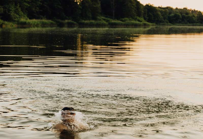 Preventive disease care - swimmers in the lake