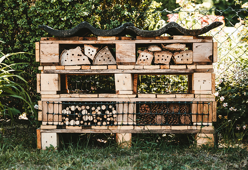 An insect hotel made from euro pallets and old roof tiles