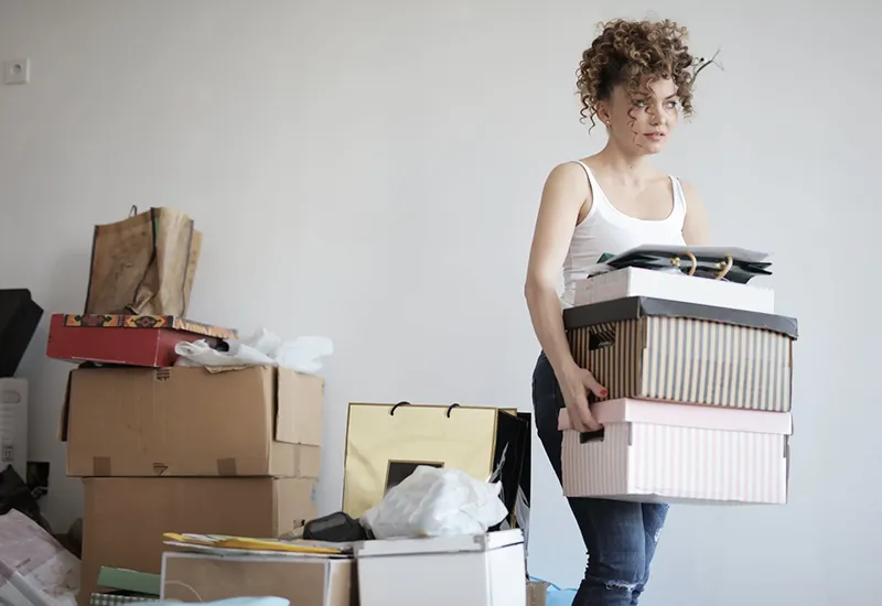 Decluttering home environmentally friendly with boxes