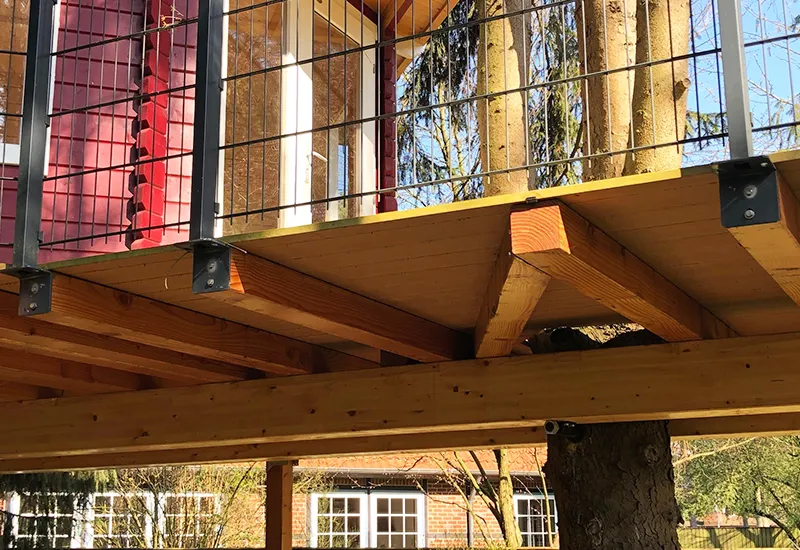 Natural garden shed in symbiosis with a tree